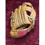 A Rawlings "Carl Ripton Jr" baseball glove.