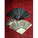 A collection of three fans.