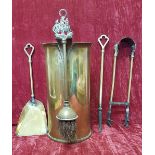 A 1942 4" brass shell case converted to a fireside companion set holder,