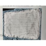 A beautiful hand knitted christening blanket or blanket suitable for a moses-basket or cot.