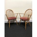 A set of four Ercol Windsor Dining Chairs.