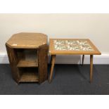 An oak octagonal table plus a converted 1970s side table with tiled top.