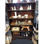 A mahogany floor standing open bookcase of four shelves.