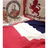 A vintage street banner from the Netherlands and a WWI Rampant Lion pennant.
