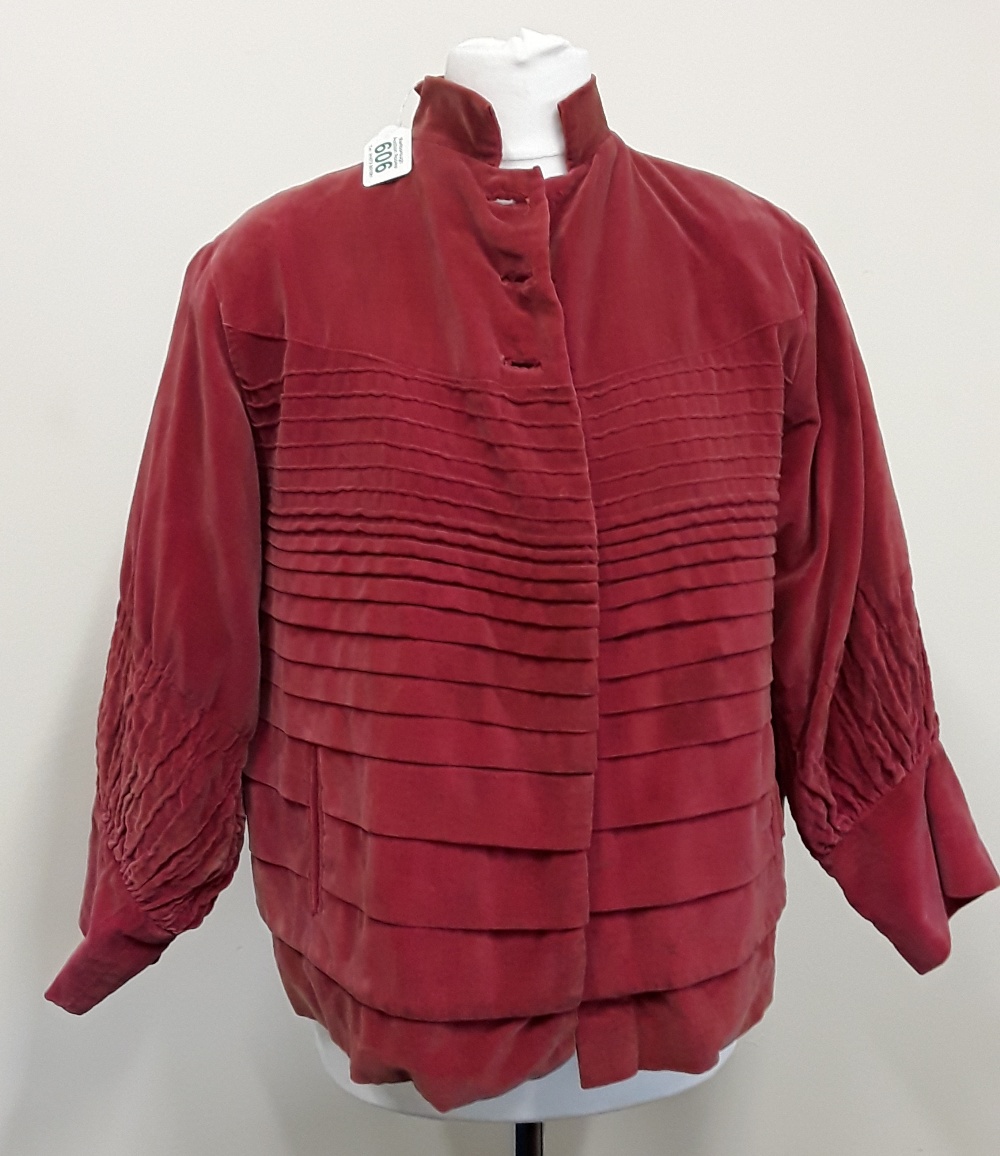 A vintage red velvet lady's jacket.