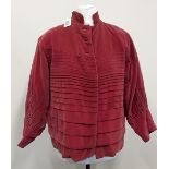 A vintage red velvet lady's jacket.