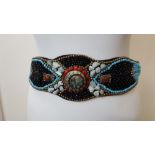 A fine semi precious bead work cummerbund set with turquoise and agate.