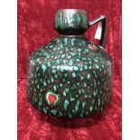 A West German 2004 .125 peacock style flagon/vase.