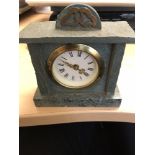 A miniature green slate mantel clock together with a Continental silver cased pocket watch.