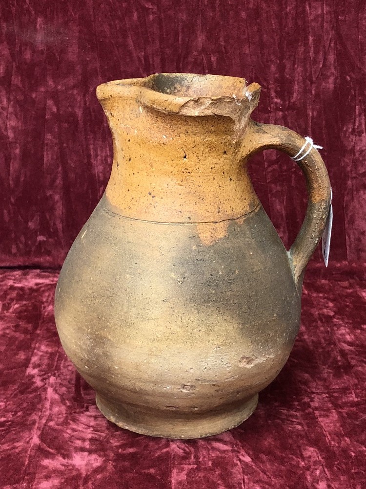 A 19th Century terracotta milk/cream jug.