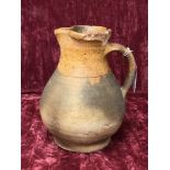 A 19th Century terracotta milk/cream jug.