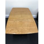 An Ercol Windsor Small Extending Table.