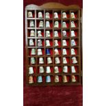 Case of 48 Royal Worcester thimbles, some signed.