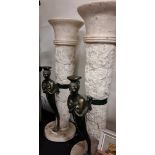 A pair of Egyptian style jardiniere classical plaster columns and matching mirror.