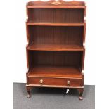 A 20th Century mahogany waterfall bookcase.