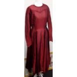 A 1930s two tone shimmer three quarter length fitted red dress.