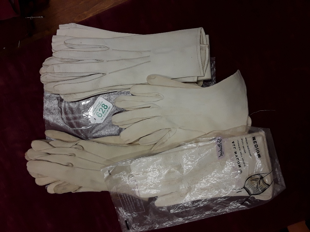 Five sets of vintage gloves.
