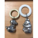 Two silver plated baby's teething rings.
