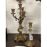 A pair of gilded French style three branch candelabra and a pair of alabaster and gilt candlesticks.