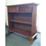 A small mahogany bookcase.