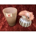 A fluted bulbous shaped vaseline glass vase and a Monart style glass vase.