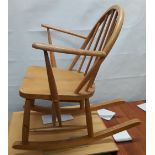 A small Ercol child's rocking chair.