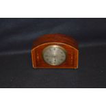 An Inlaid Mahogany Mantle Clock