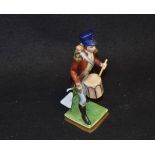 A Drumming Soldier Figurine