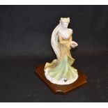 A Coalport, Elements Figurine 'The Earth'