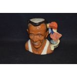 A Royal Doulton Jug 'Jesse Owens'