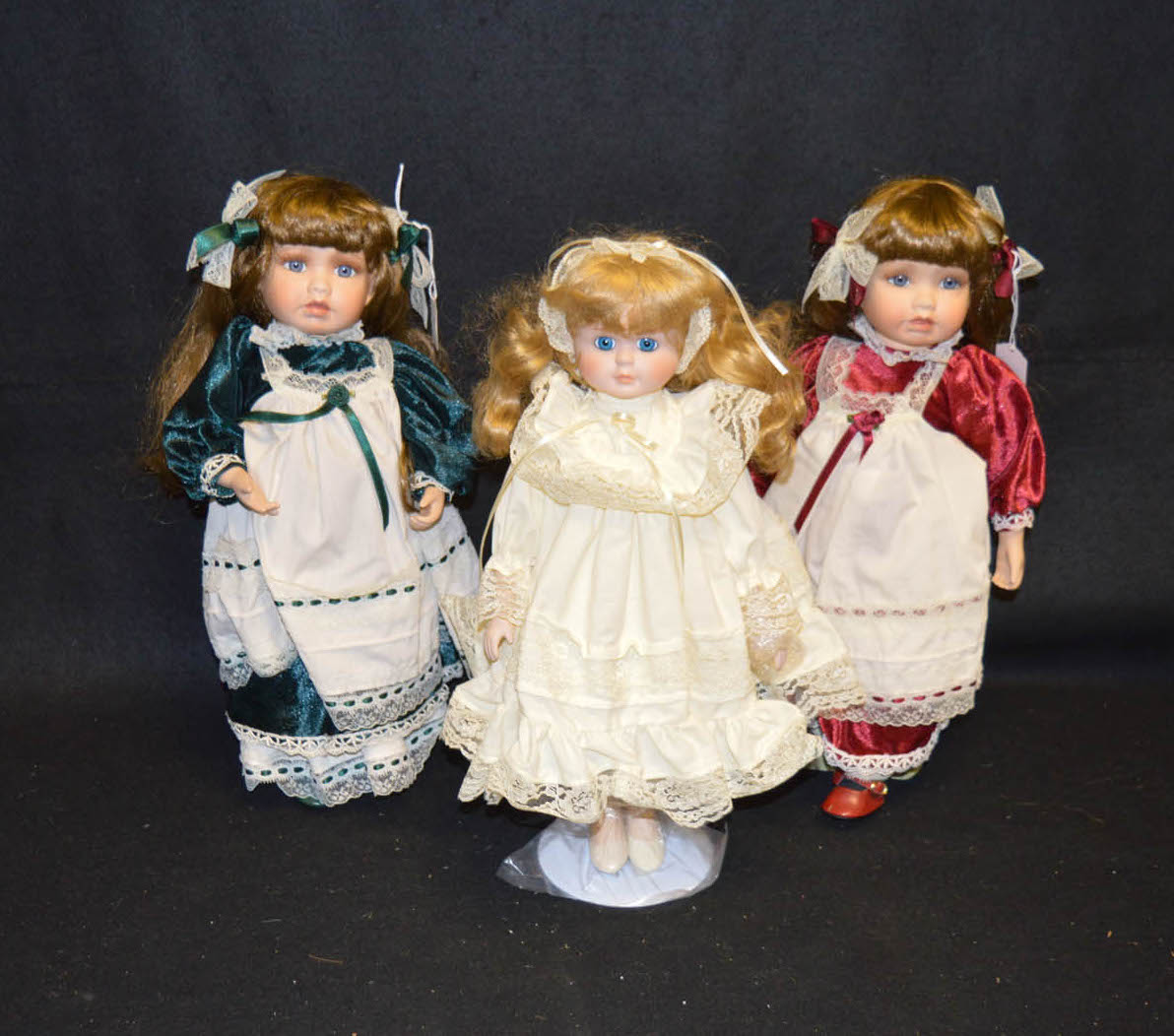 A Lot of Three Collectors Dolls