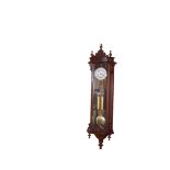 A Superb Mahogany Double Weight Vienna Clock