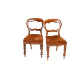 A Pair of Mahogany Framed Balloon Back Chairs