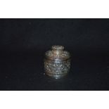 An Embossed Silver Lidded Jar