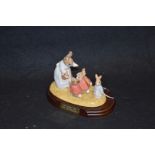 A Royal Doulton Figurine 'Mrs Rabbit and the Four Bunnies'