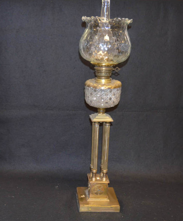 An Unusual Four Pillar Brass Based Oil Lamp and Shade