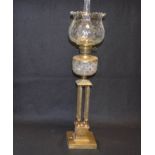 An Unusual Four Pillar Brass Based Oil Lamp and Shade