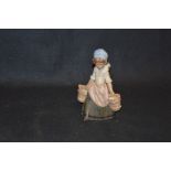 A Lladro Figurine 'Girl with Buckets'