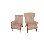 A Very Good Pair of Parker Knoll Upholstered Ladies and Gents Chairs