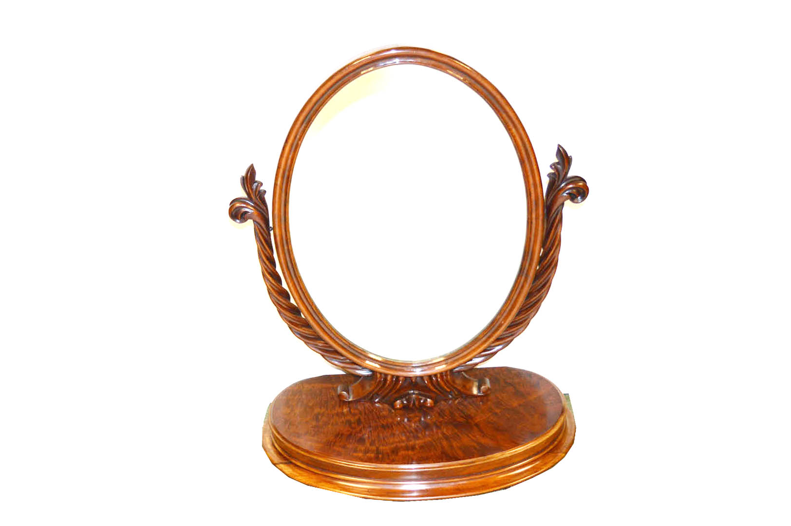 A Very Fine Mahogany Oval Based Mirror On Stand