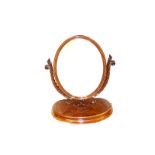 A Very Fine Mahogany Oval Based Mirror On Stand