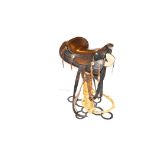 A Very Nice Hand Crafted Saddle on Feet, Horse Shoe Display Base