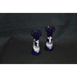 A Pair of Blue Glass Mary Gregory Vases