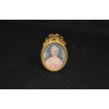 A Gilt Framed Oval Miniature of a Young Lady