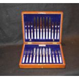 A Mother of Pearl Handled Cased Set of Dessert Knives and Forks