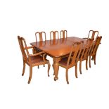 A Very Good Oak Extending Dining Room Suite, Comprising Table, Two Leaves and Set of 8 Matching Tall