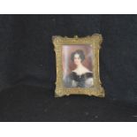 A Framed Miniature of a Young Lady