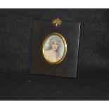 An Oval Framed Miniature of a Young Lady