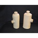 A Pair of Earthenware Hot Water Bottle Bookends