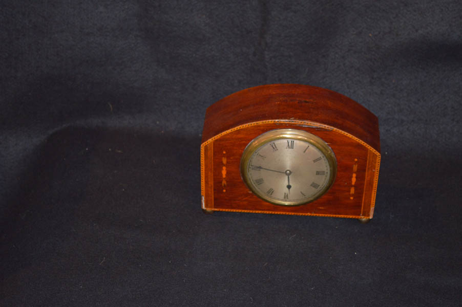 An Inlaid Mahogany Mantle Clock